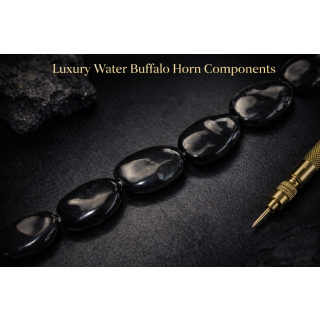 Horn irregular Teardrop dented black ca.28x19x7mm