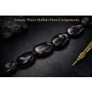 Horn irregular Teardrop dented black ca.28x19x7mm