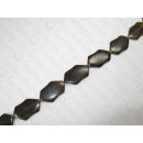 Brown horn, irregular hexagon, ca. 38x22x6mm