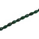 Steinperlen Dyed green jade faceted oval    / 9mm.