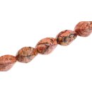 Stone  dyed orange Serpentine twisted oval / 25mm.