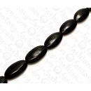 Wood beads Faceted Oval Black Kamagong ca. 35mm / 11pcs.